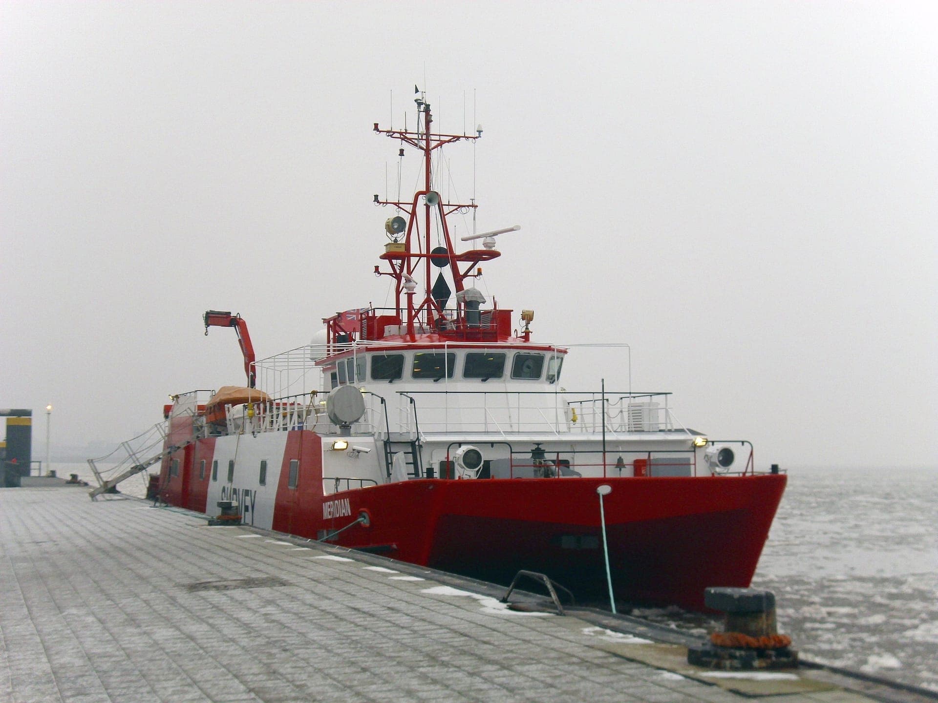 Survey vessel moored at a quay